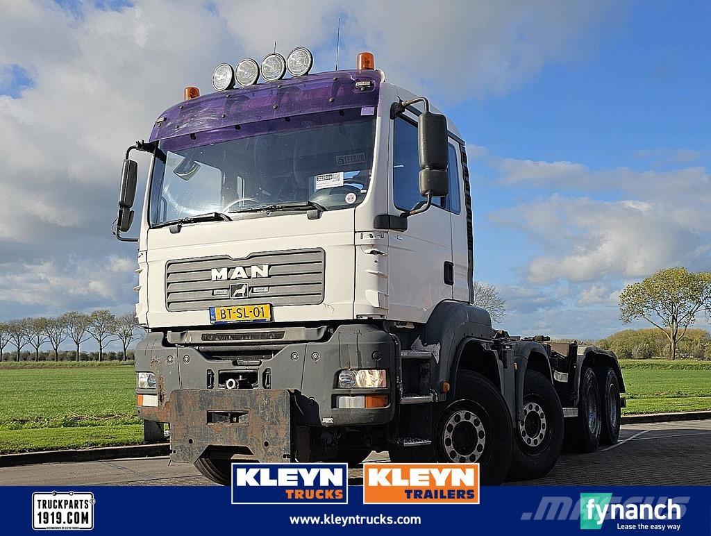 MAN 41.400 TGA Rol kiper kamioni s kukama za dizanje