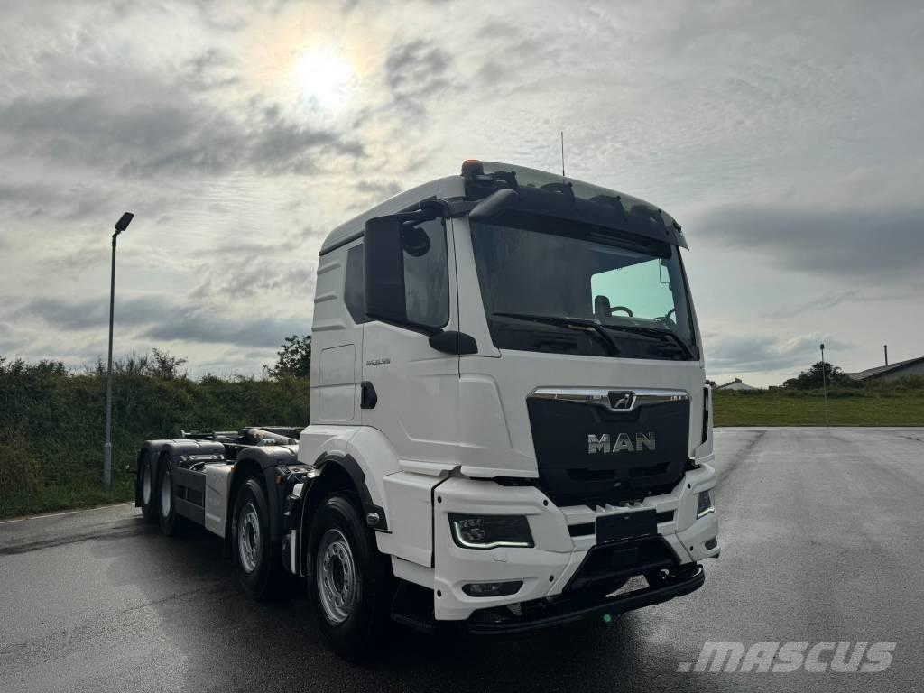 MAN TGS 35.520 Rol kiper kamioni s kukama za dizanje
