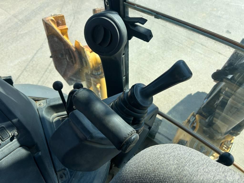John Deere 310K Utovarni rovokopači