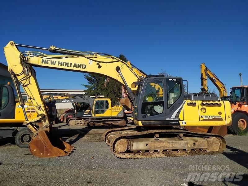 New Holland E 265 C Bageri gusjeničari