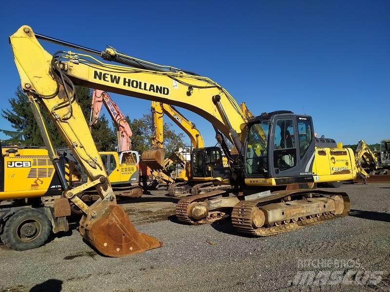 New Holland E 265 C Bageri gusjeničari