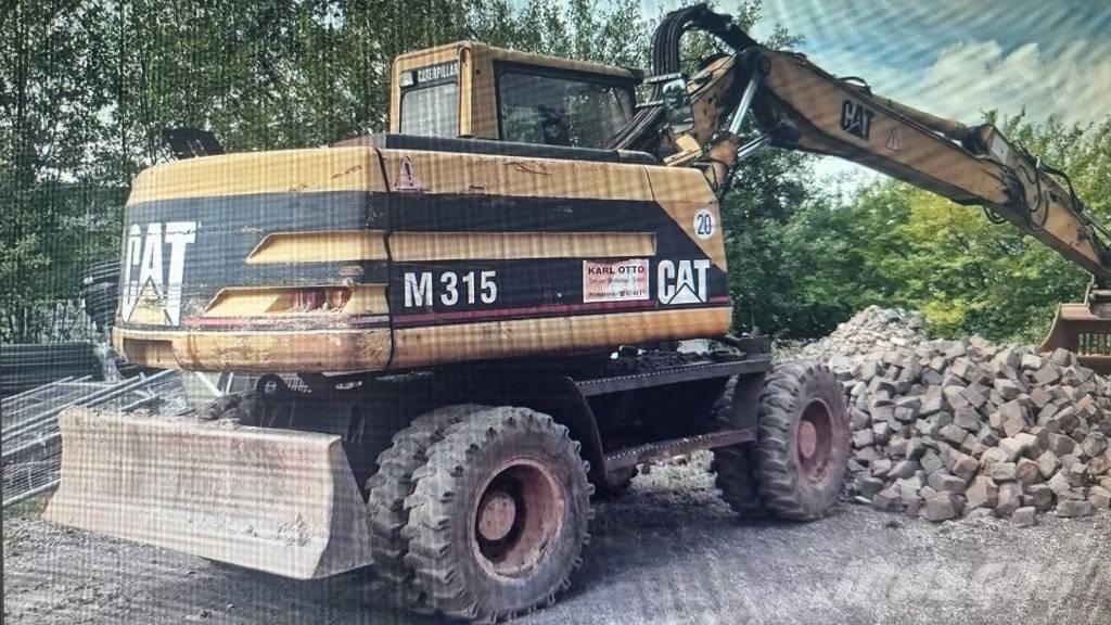 CAT M 315 Bageri na kotačima