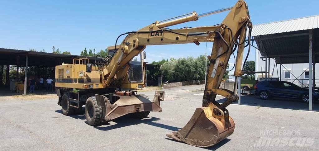 CAT 214 B Bageri na kotačima