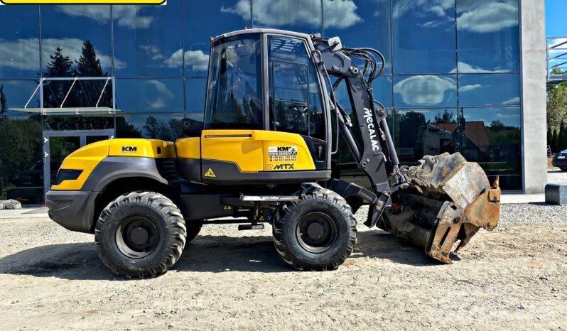 Mecalac 12 M TX Utovarni rovokopači