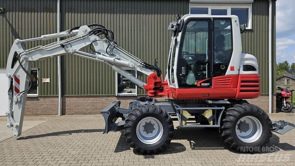 Takeuchi TB295W Bageri na kotačima