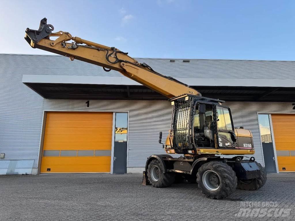 CAT M315C Bageri na kotačima