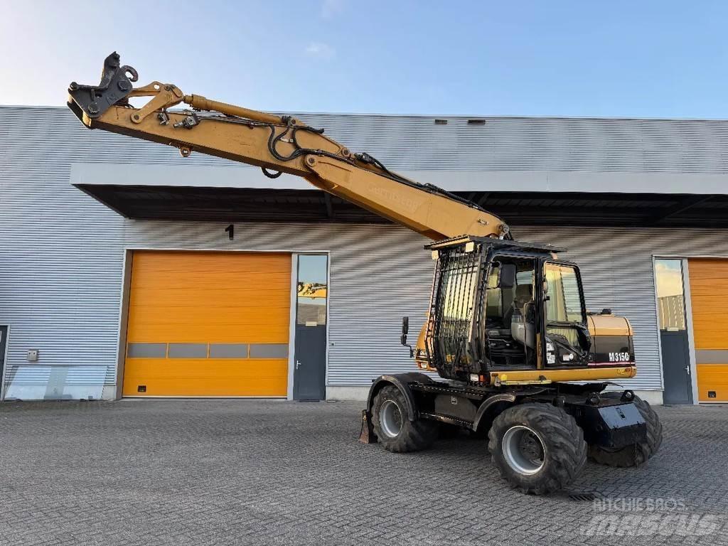 CAT M315C Bageri na kotačima