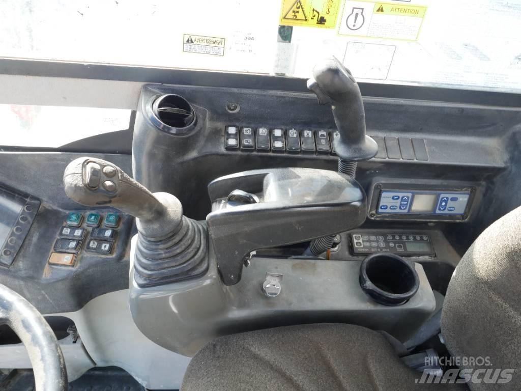 Takeuchi TB 295 W Bageri na kotačima