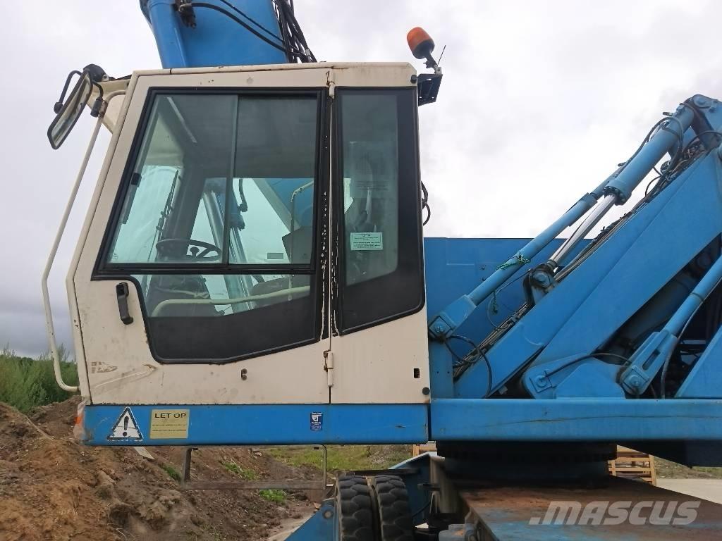 Fuchs MHL 360 Bageri za manipuliranje materijalom / otpadom