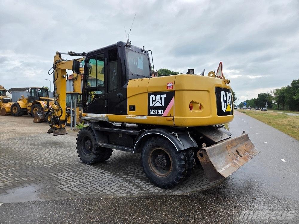 CAT M313D Bageri na kotačima