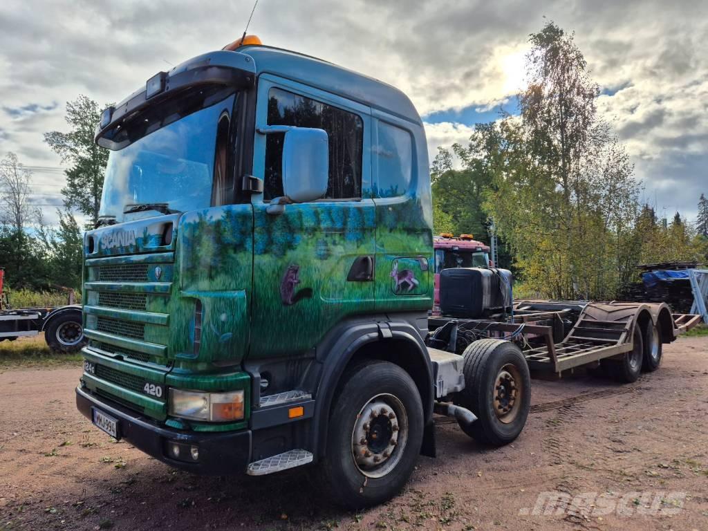 Scania R 124 Kamioni za prijevoz šumskih strojeva