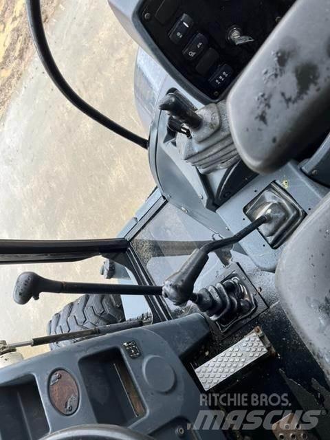 Terex TLB840R Utovarni rovokopači