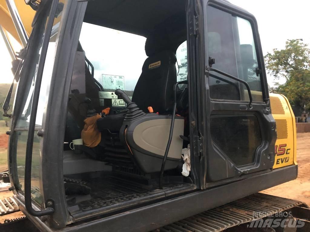 New Holland E 145 Bageri gusjeničari