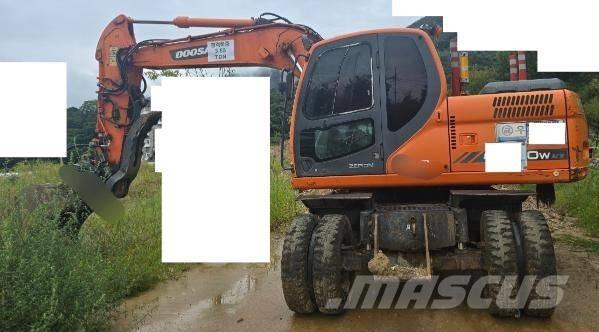 Doosan DX 140 W Bageri na kotačima