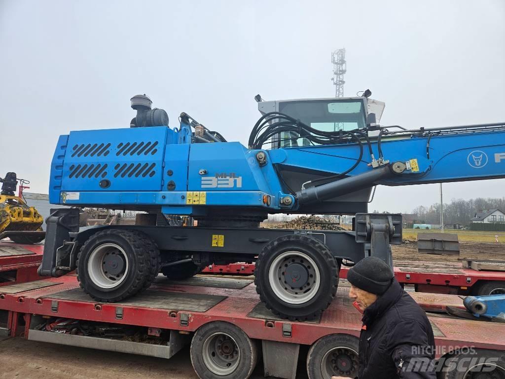 Fuchs MHL 331 Bageri za manipuliranje materijalom / otpadom