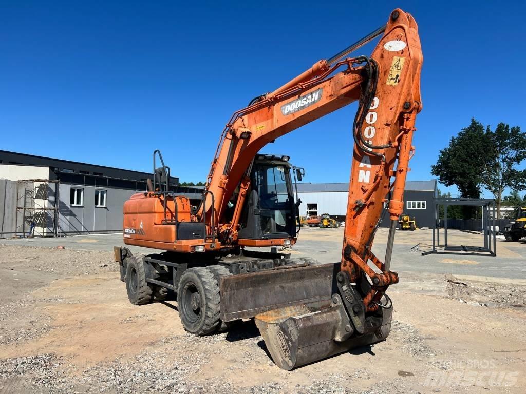 Doosan DX 140 W Bageri na kotačima