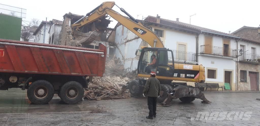 CAT M318d Bageri na kotačima