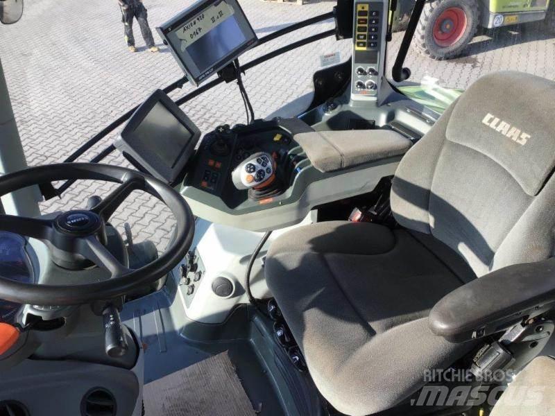 CLAAS AXION 920 Traktori