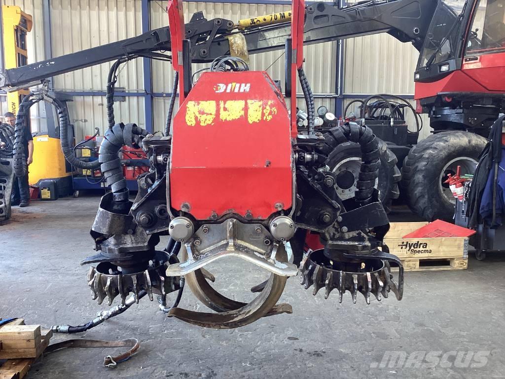 Komatsu C124 Strojevi za kleščenje grane drveća