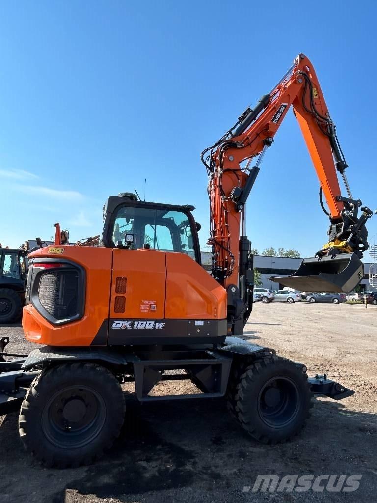 Develon DX 100 W-7 Bageri na kotačima