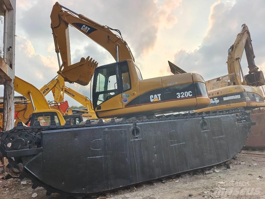 CAT 320 C Amfibijski bageri