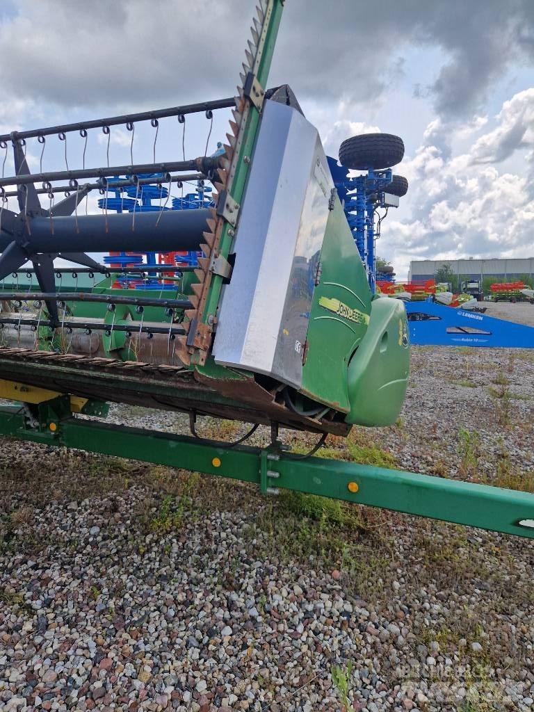 John Deere T670 Kombajni