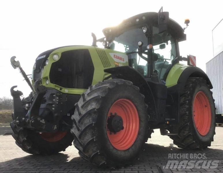 CLAAS AXION 810 Traktori