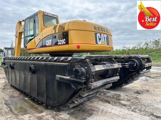 CAT 320 C Amfibijski bageri