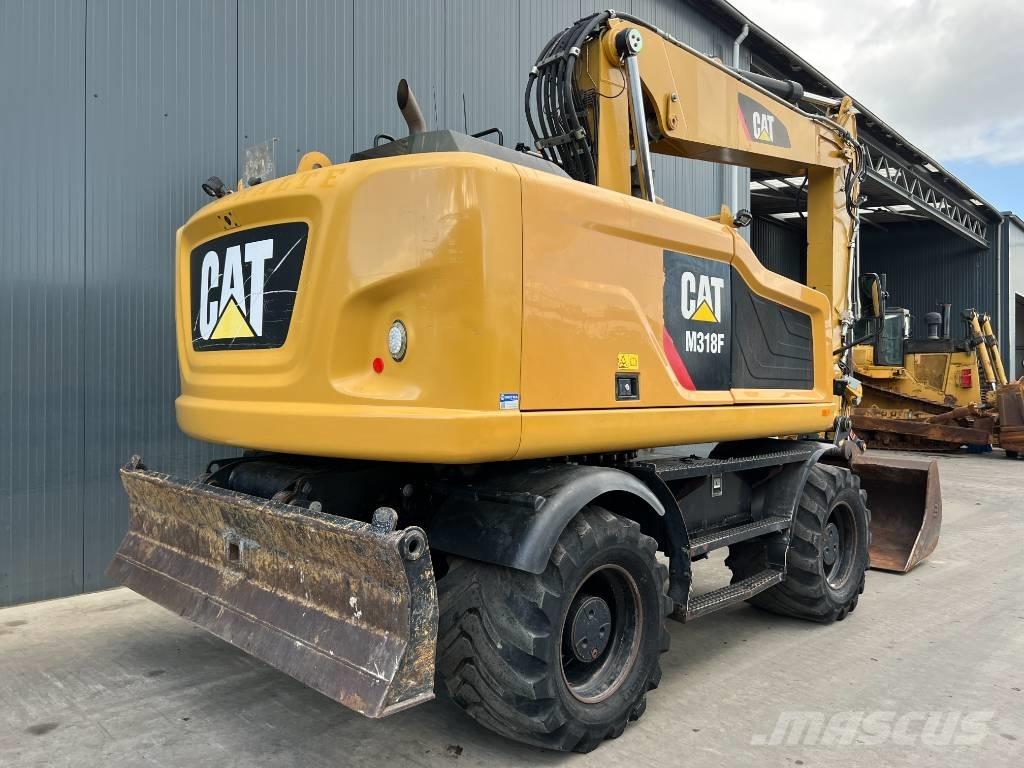 CAT M318F Bageri na kotačima
