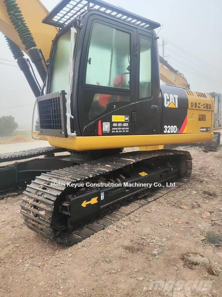 CAT 323 Bageri gusjeničari