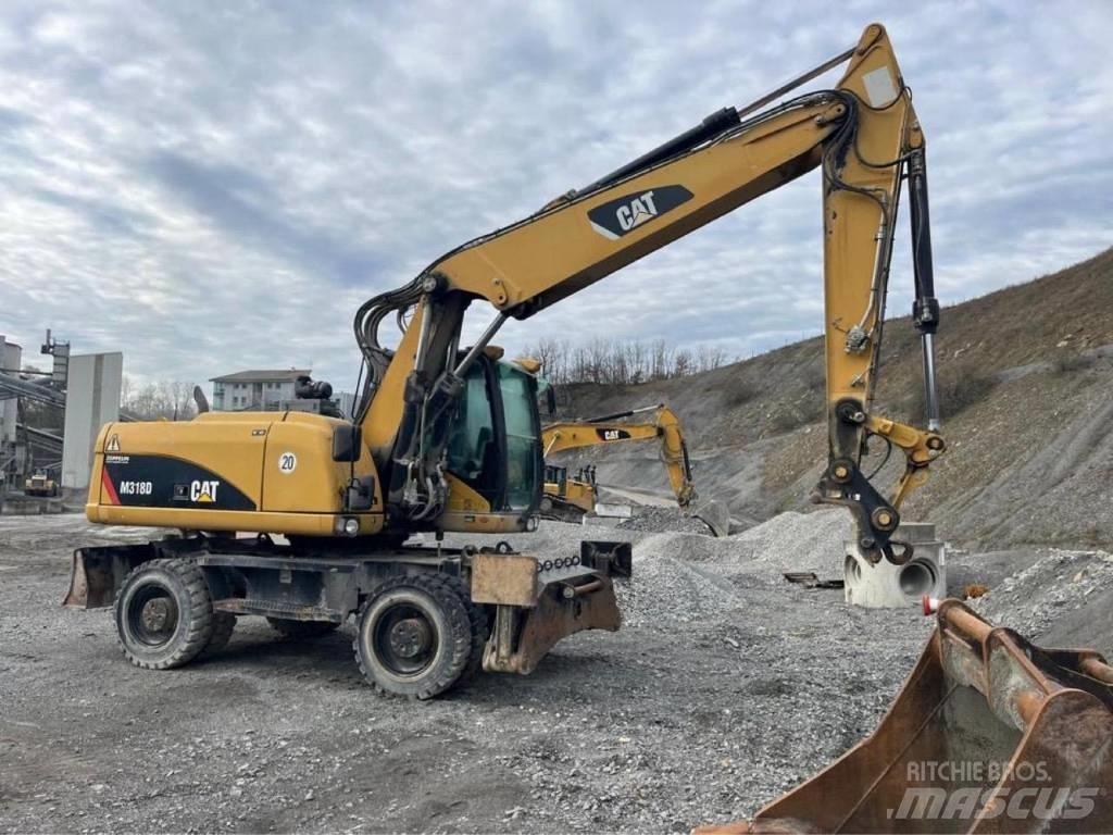 CAT M318D Bageri na kotačima
