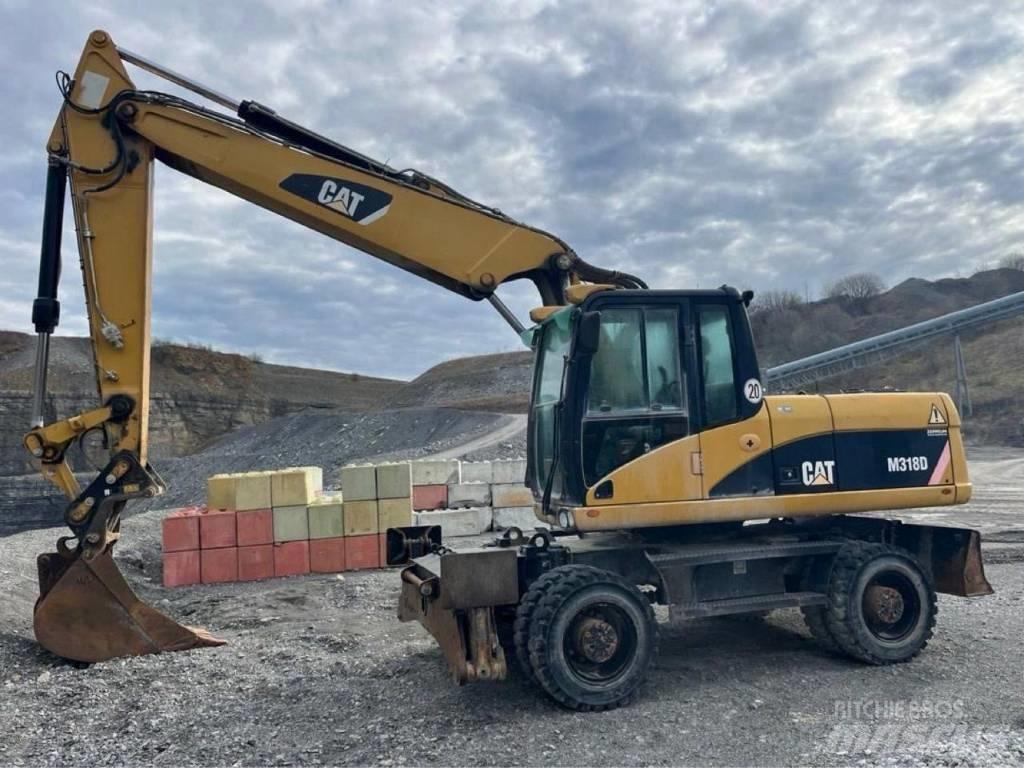 CAT M318D Bageri na kotačima