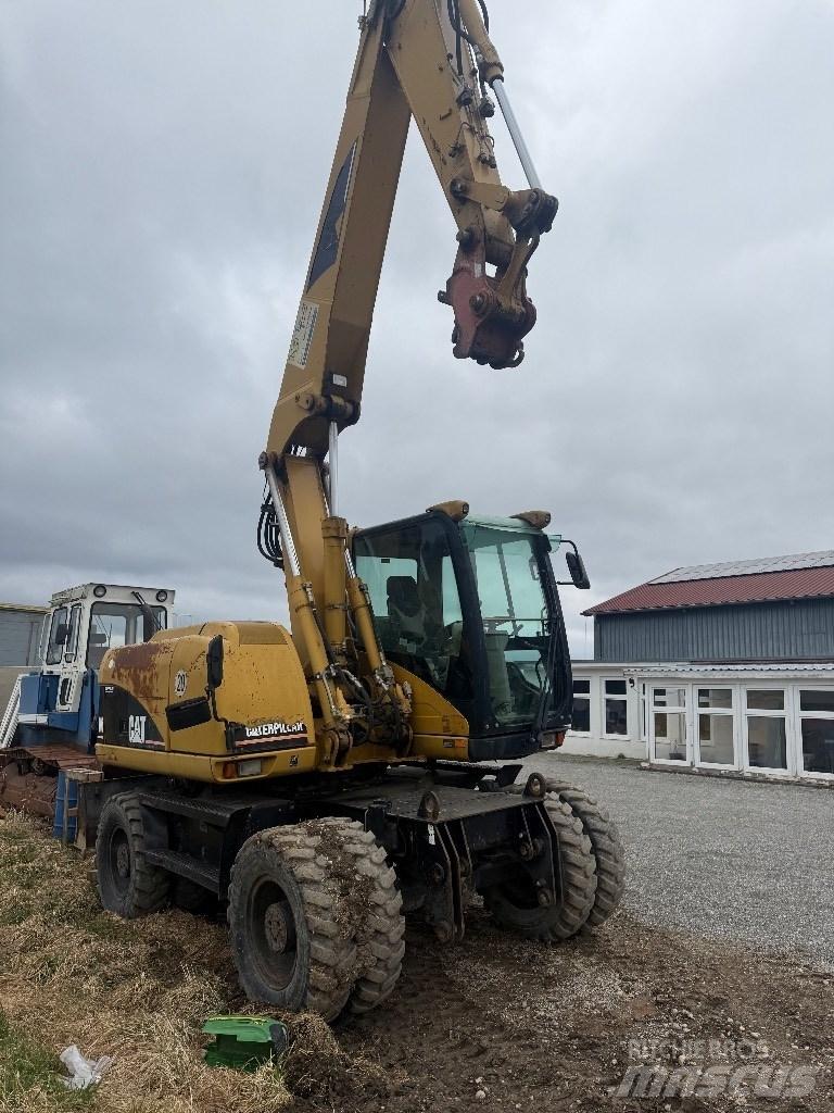 CAT M 313 C Bageri na kotačima