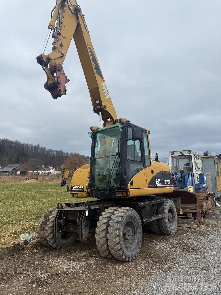 CAT M 313 C Bageri na kotačima