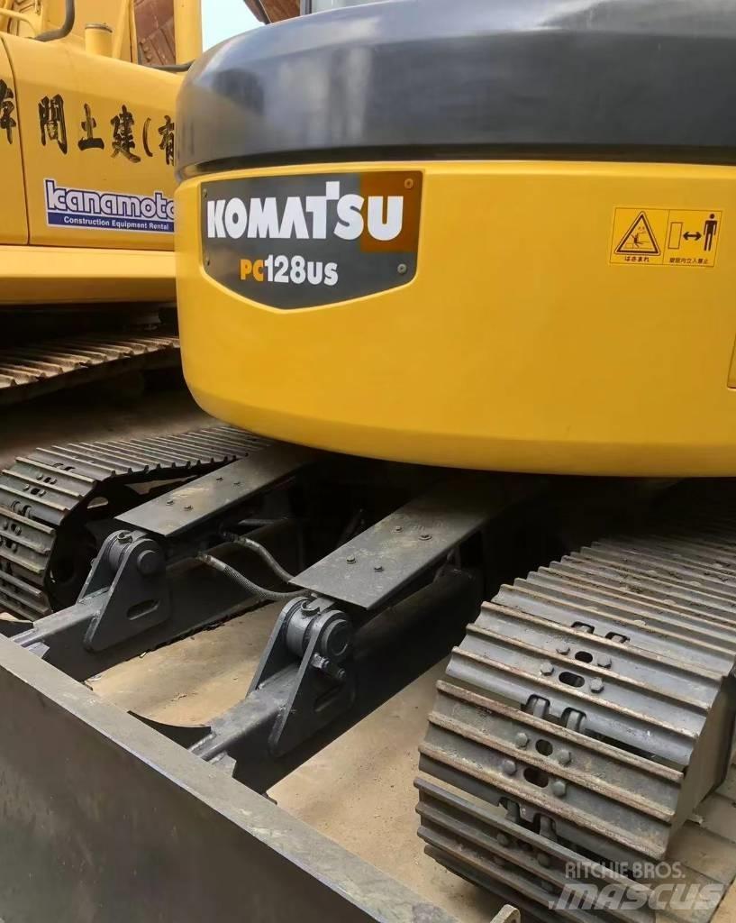 Komatsu 128 US Bageri gusjeničari