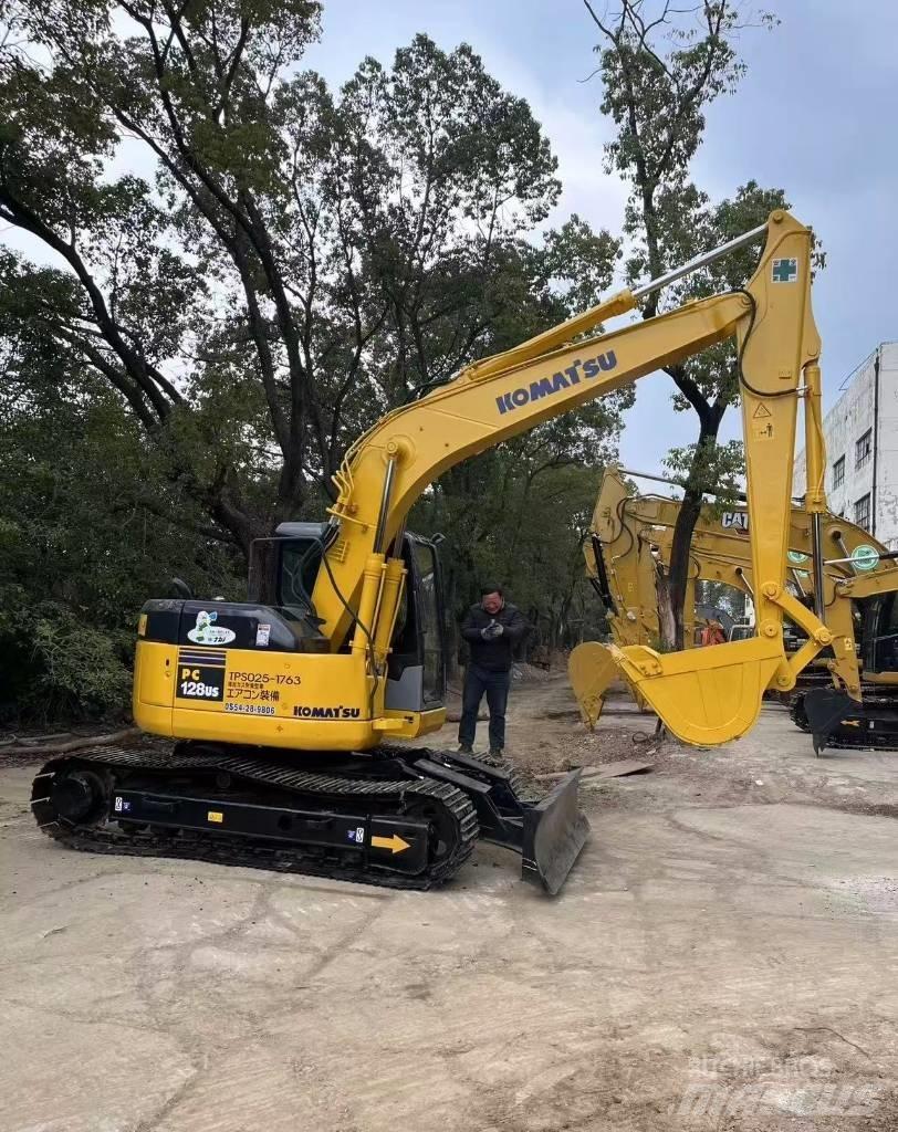 Komatsu 128 US Bageri gusjeničari