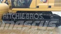 CAT 2022 CAT 323GC Bageri na kotačima