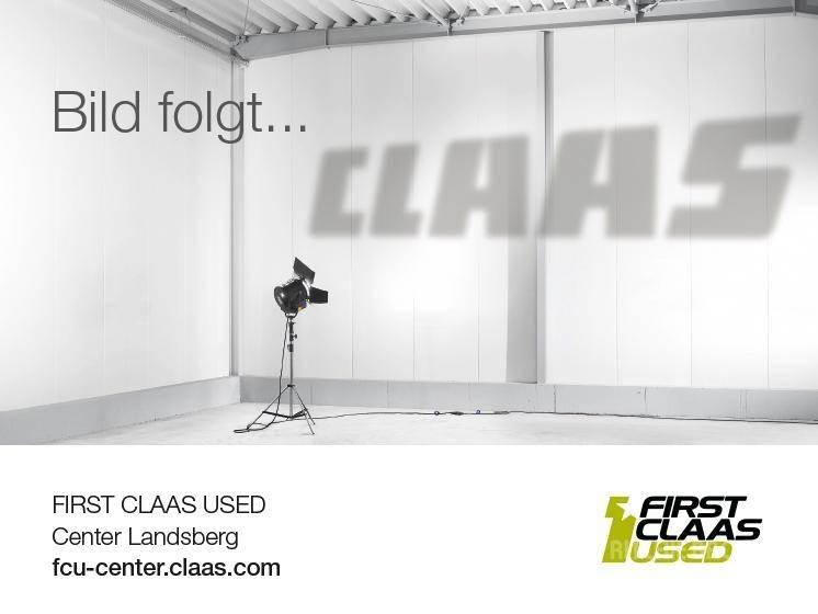 CLAAS LEXION 7400 Kombajni