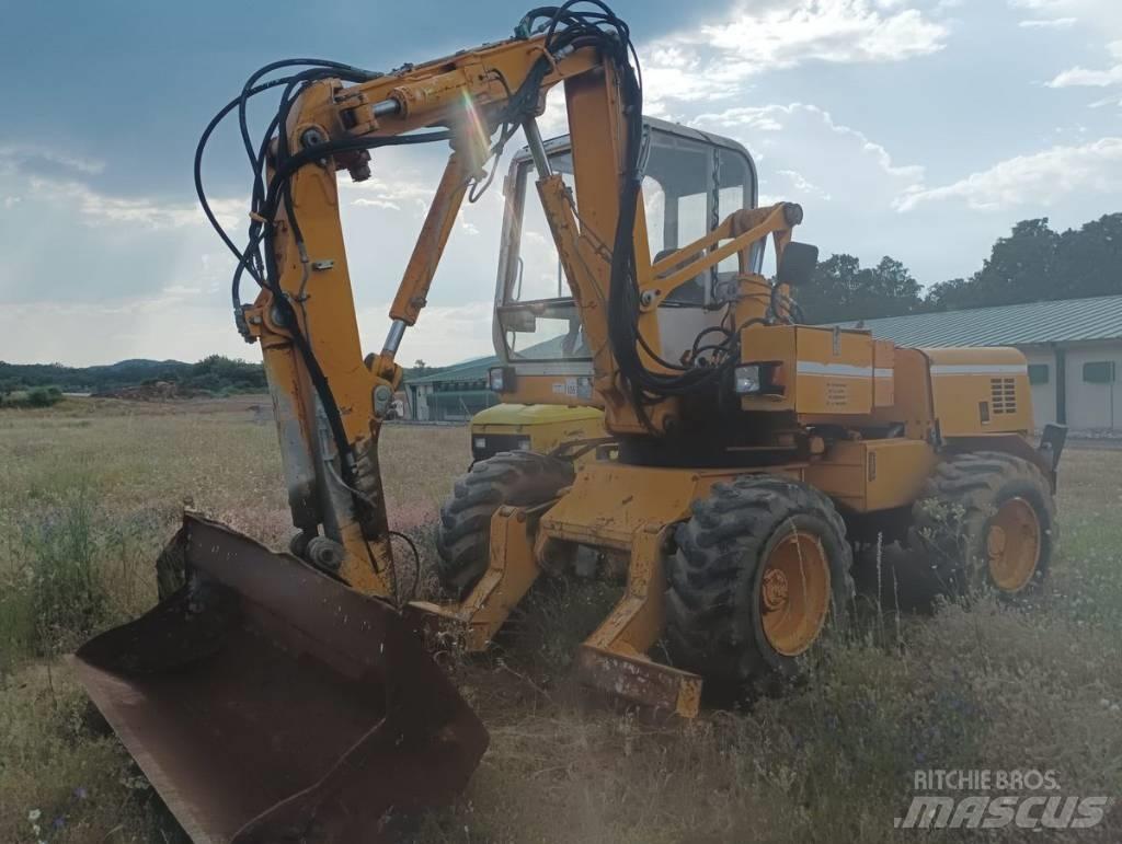 Mecalac 11 CX Bageri na kotačima