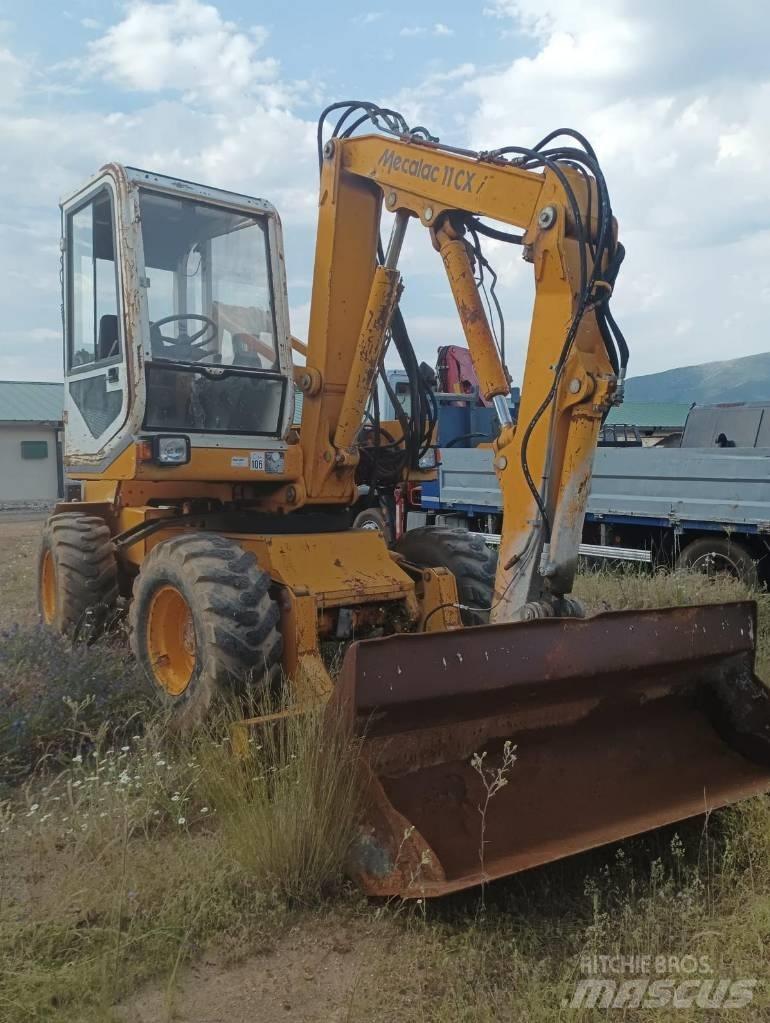 Mecalac 11 CX Bageri na kotačima