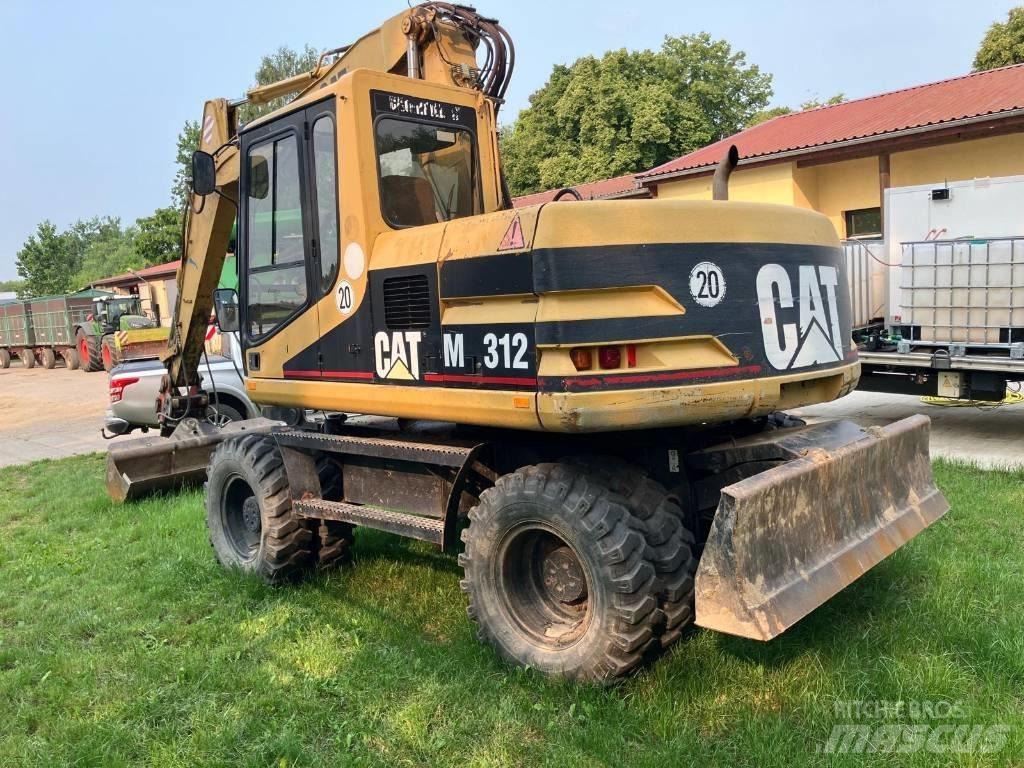 CAT M 312 Bageri na kotačima