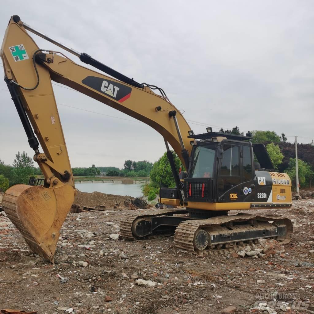 CAT 323DL Bageri gusjeničari