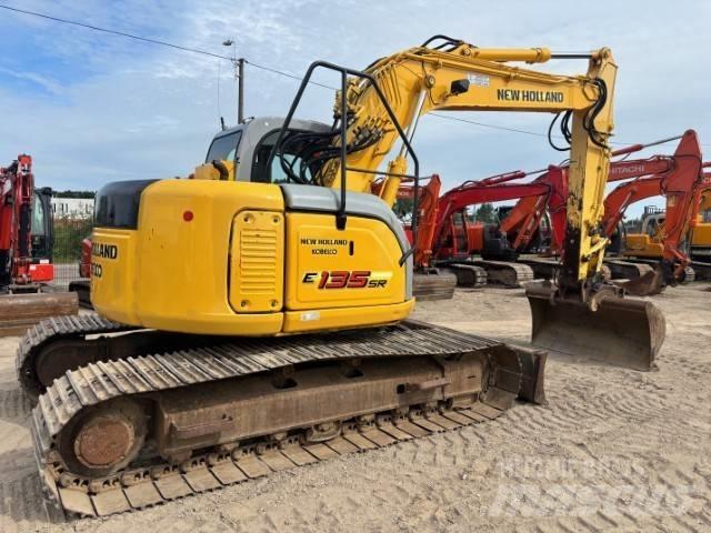 New Holland E 135 SR Bageri gusjeničari