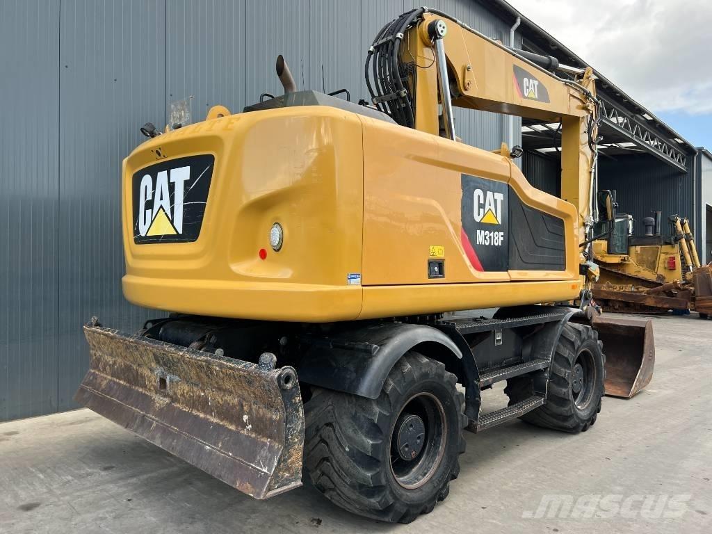 CAT M318F Bageri na kotačima