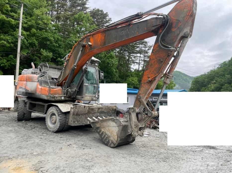 Doosan DX 210 W Bageri na kotačima