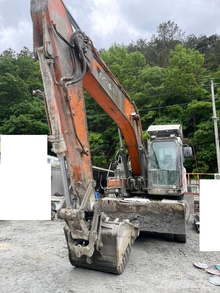 Doosan DX 210 W Bageri na kotačima