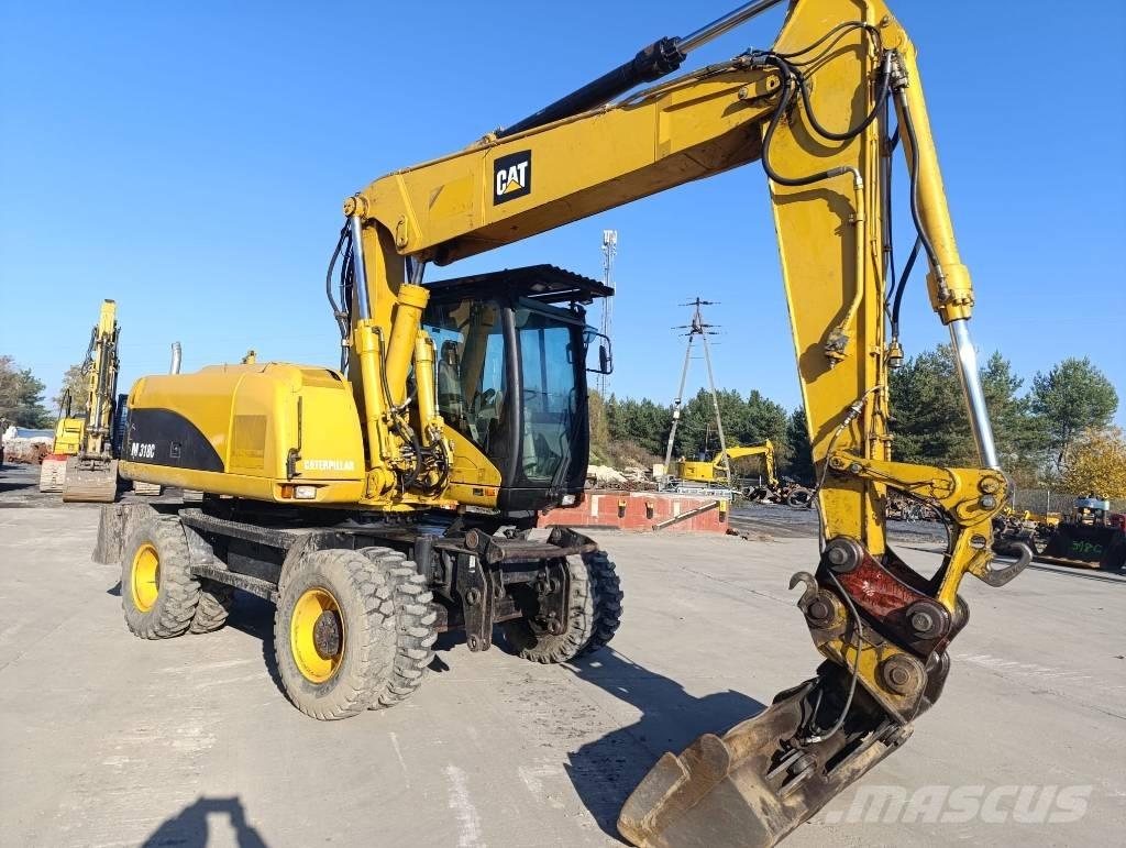 CAT M 318 C Bageri na kotačima