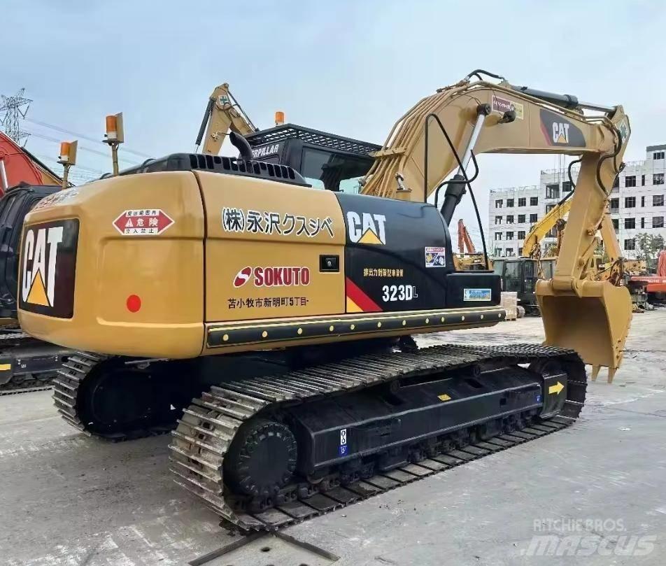 CAT 323 Bageri gusjeničari