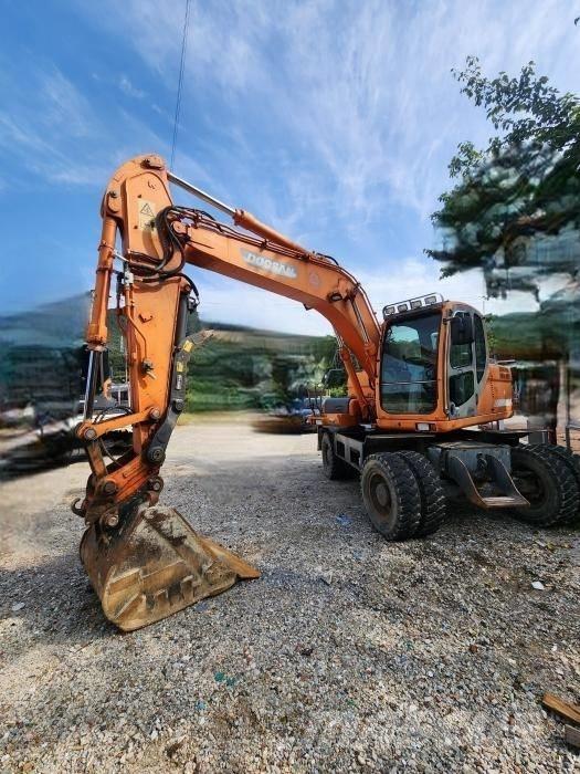 Doosan DX 140 W Bageri na kotačima