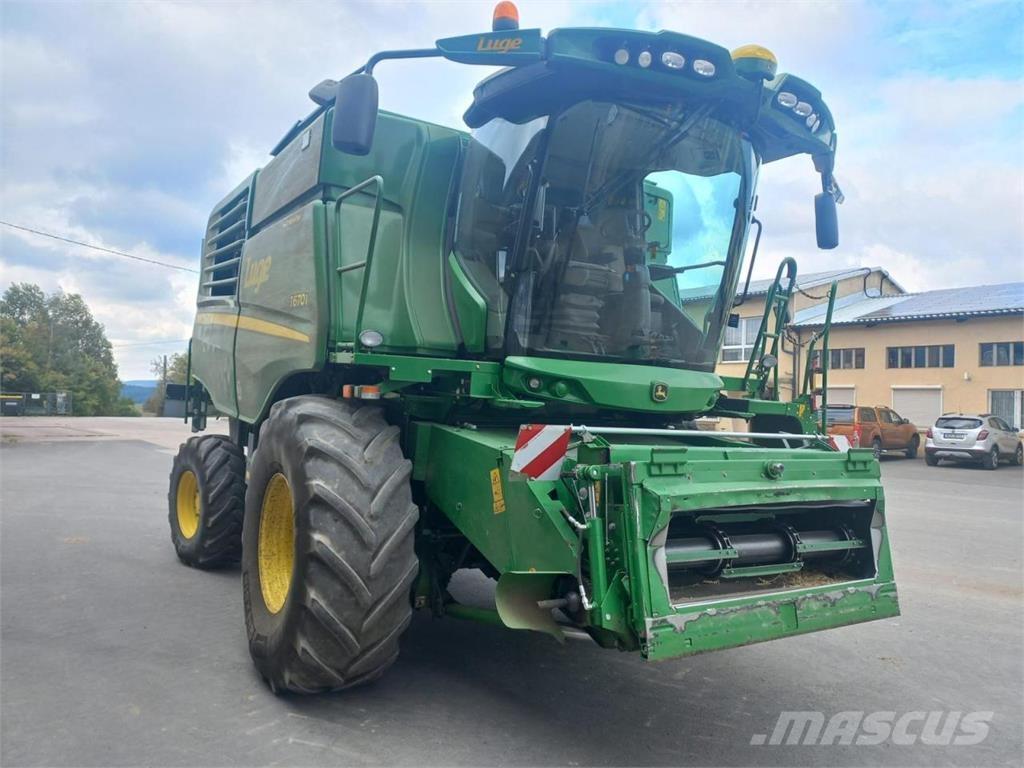 John Deere T670 HM Kombajni